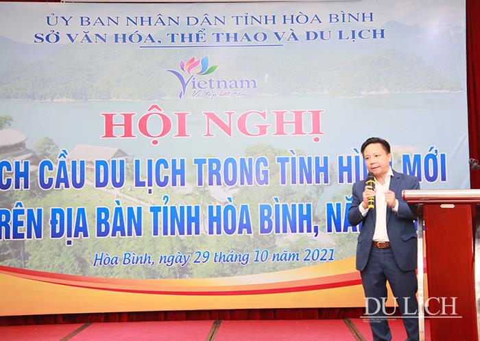 Chủ tịch CLB Lữ hànhUNESCO Hà Nội Trương Quốc Hùng chia sẻ tại hội nghị